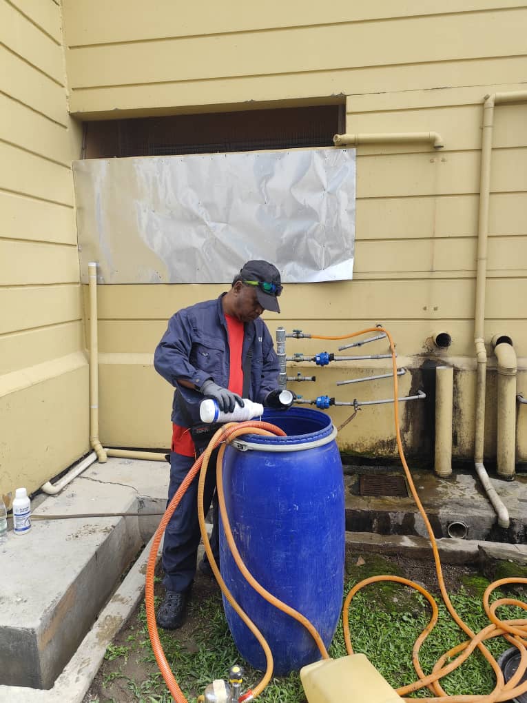 GPC technician preparing treatment on site